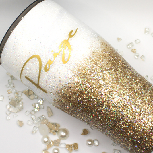 White and gold glitter tumbler cup with straw and lid